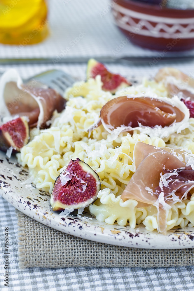 Pasta (Mafalde short), Italian cuisine. Selective focus. Pasta (Mafalde short), Italian cuisine. Selective focus.