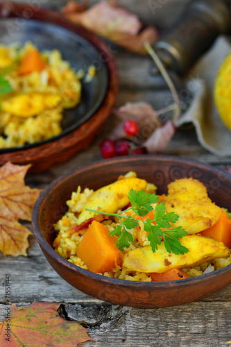 rice curry with fried fish and pumpkin