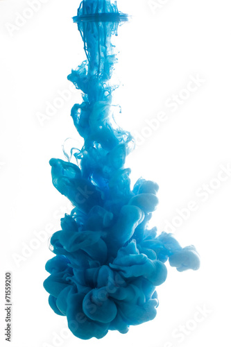 Ink swirling in water, cloud of ink in water isolated on white.