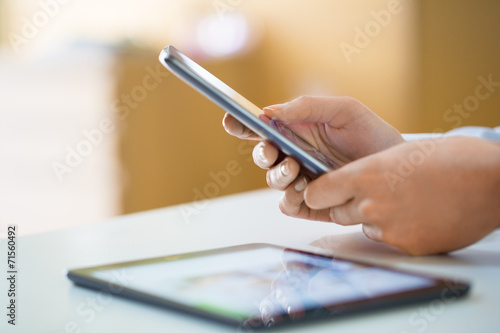 Woman using mobile phone, message sms email