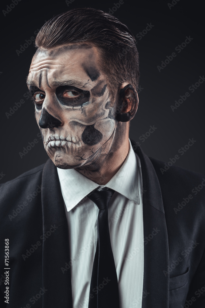 incredulous businessman with makeup skeleton incredulous businessman with makeup skeleton
