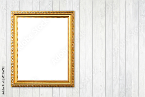 blank golden frame on wood wall