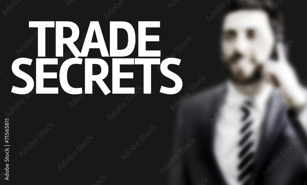 Business man with the text Trade Secrets Business man with the text Trade Secrets