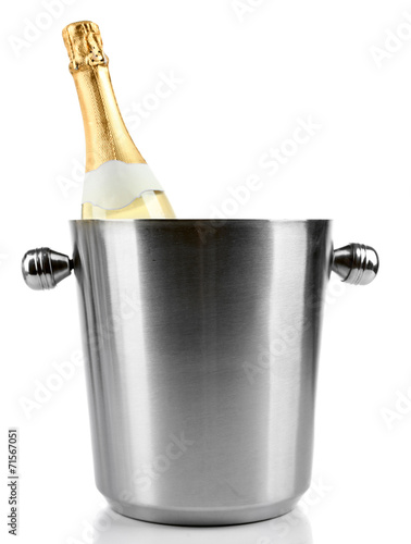 Bottle of champagne in bucket, isolated on white