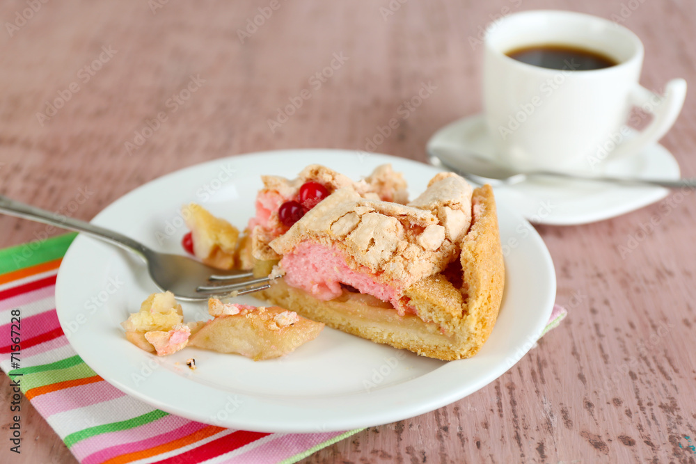Piece of tasty pie with apples and berry mousse and cup of Piece of tasty pie with apples and berry mousse and cup of