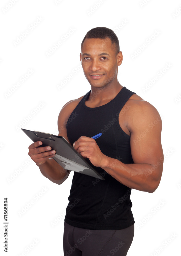 Handsome guy filling the form of the gym Handsome guy filling the form of the gym