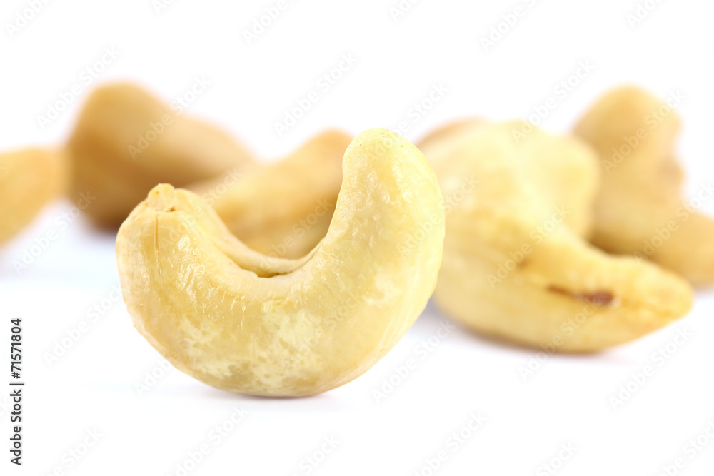 Several cashew nuts, isolated on white