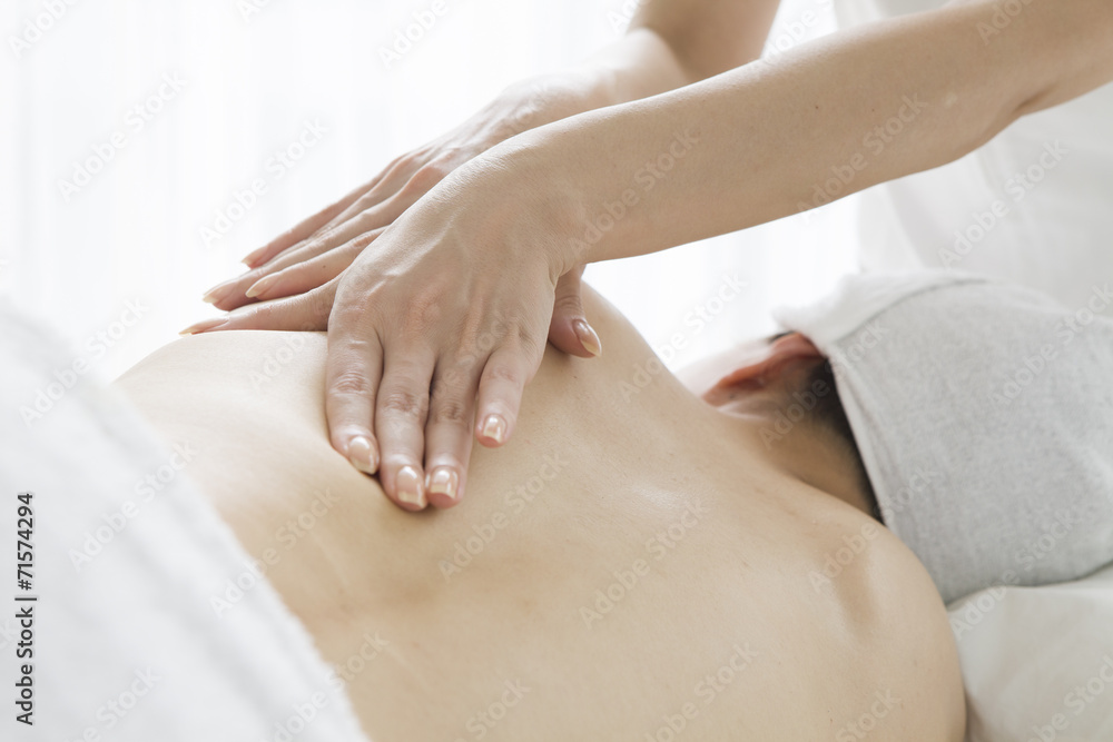 Naklejka premium Massage loosening the scapula