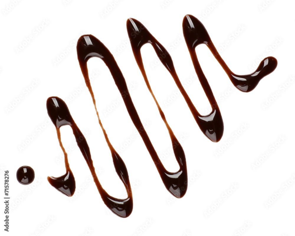 Chocolate syrup drips isolated on white Chocolate syrup drips isolated on white