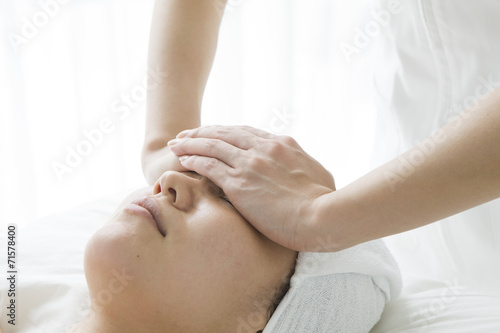 Women receiving a facial massage