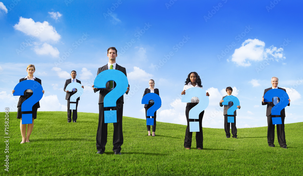 Group of Business People Holding Question Mark Group of Business People Holding Question Mark