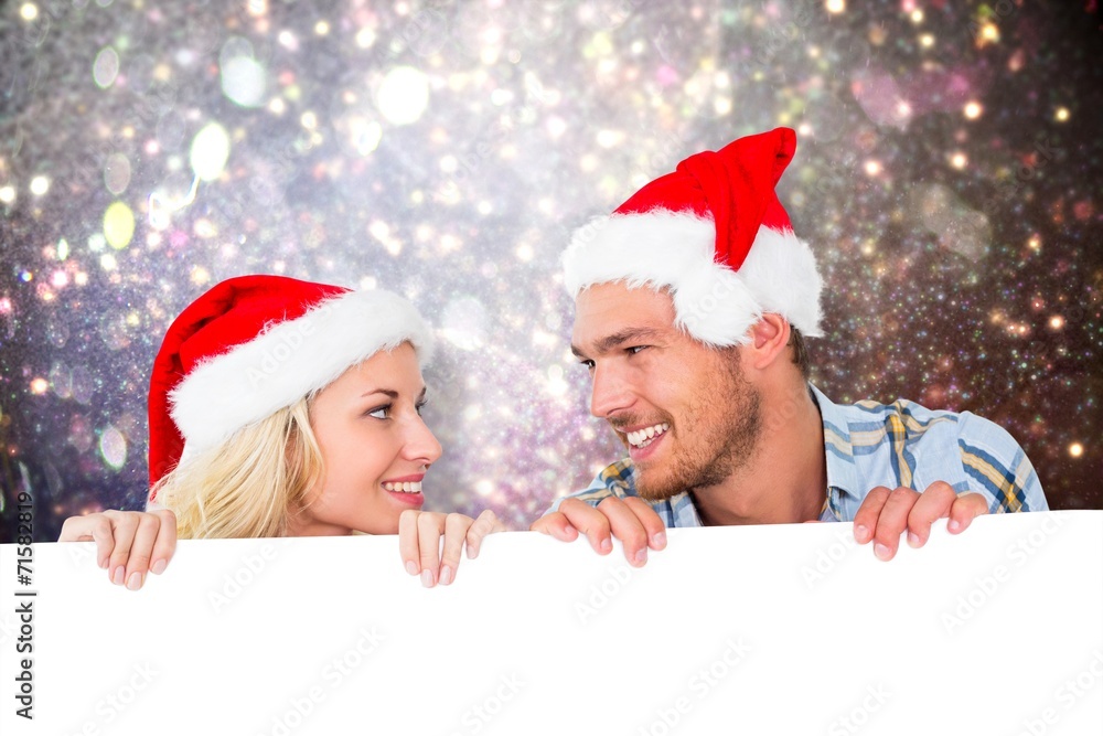 Composite image of young festive couple Composite image of young festive couple