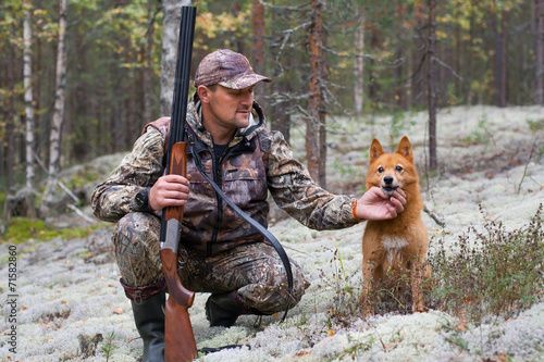 the hunter with his dog
