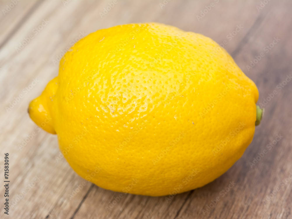 Whole Lemon On Wood Table