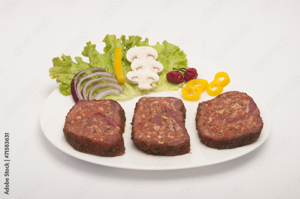 Raw pork Meat Loaf with spices on white