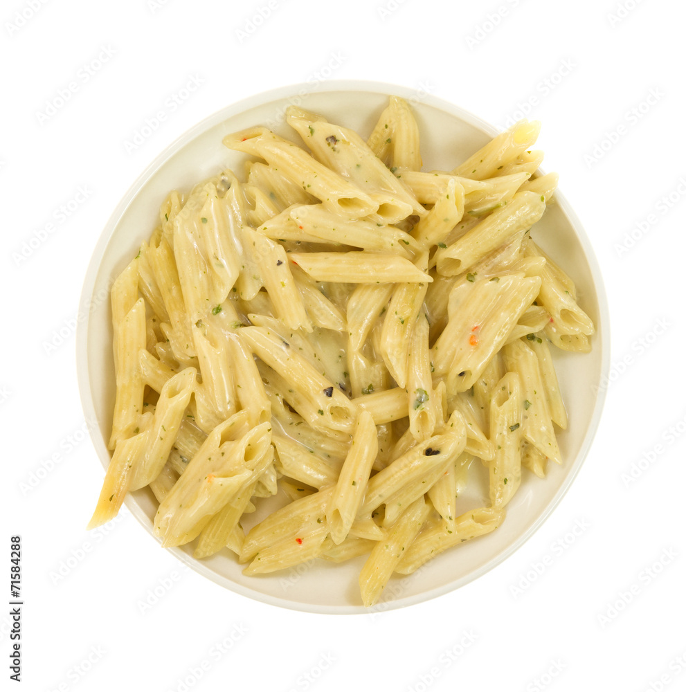 Cooked pasta with garlic and parsley in a cream sauce Cooked pasta with garlic and parsley in a cream sauce