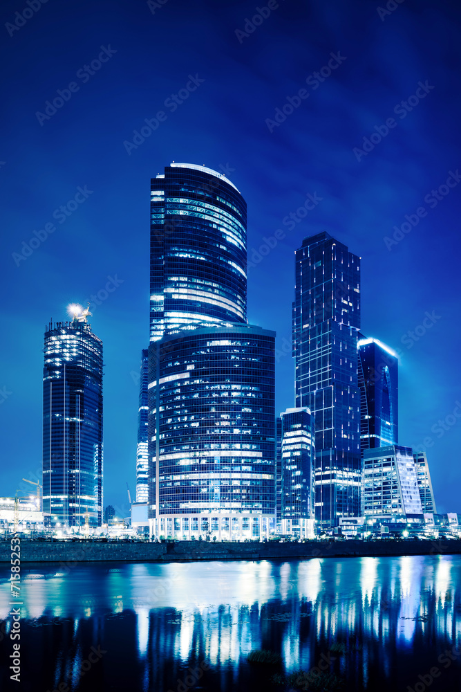 Modern business skyscrapers at night