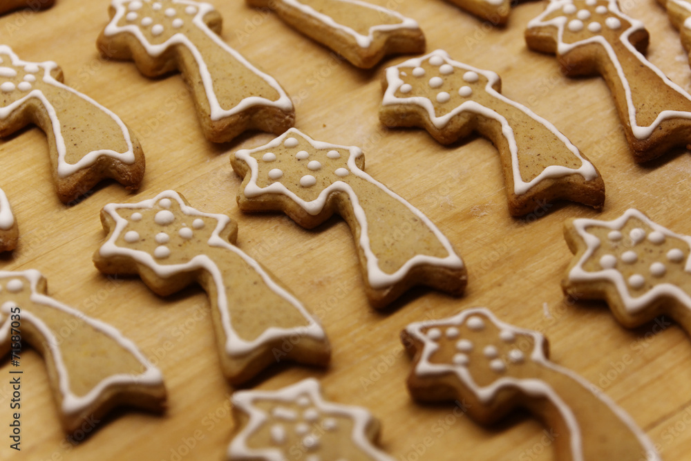 Star shaped gingerbread on a wooden table Star shaped gingerbread on a wooden table
