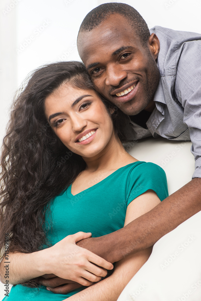 Romantic young couple relaxing on sofa. Romantic young couple relaxing on sofa.