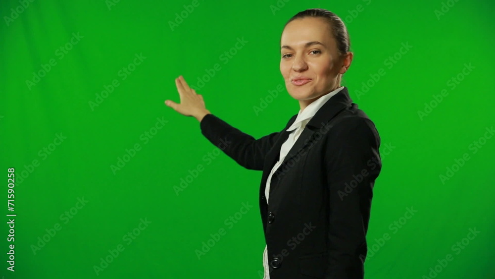 Weather girl is giving forecast on a green screen.FULL HD.