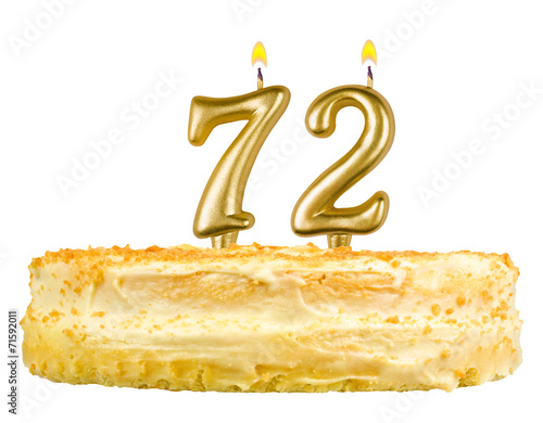 birthday cake with candles number seventy two isolated on white photo