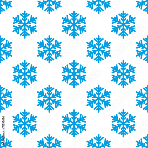 Seamless pattern of blue snowflakes on a white background