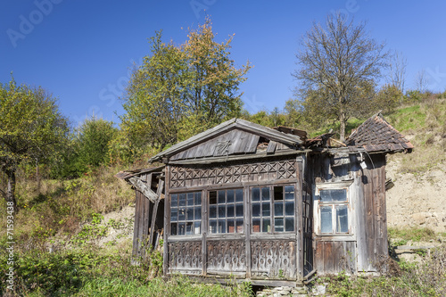 Old, ruined wooden house