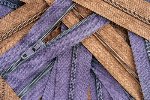 purple and brown clothing zippers