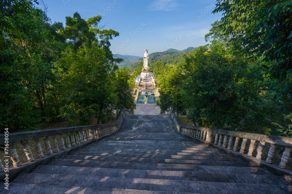 Stairs to statue of Guan Yin / Kuan Im goddess and pool in front