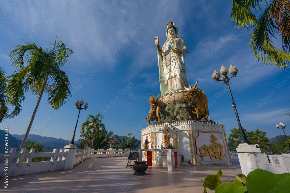 Place of worship in front of statue of Guan Yin / Kuan Im goddes