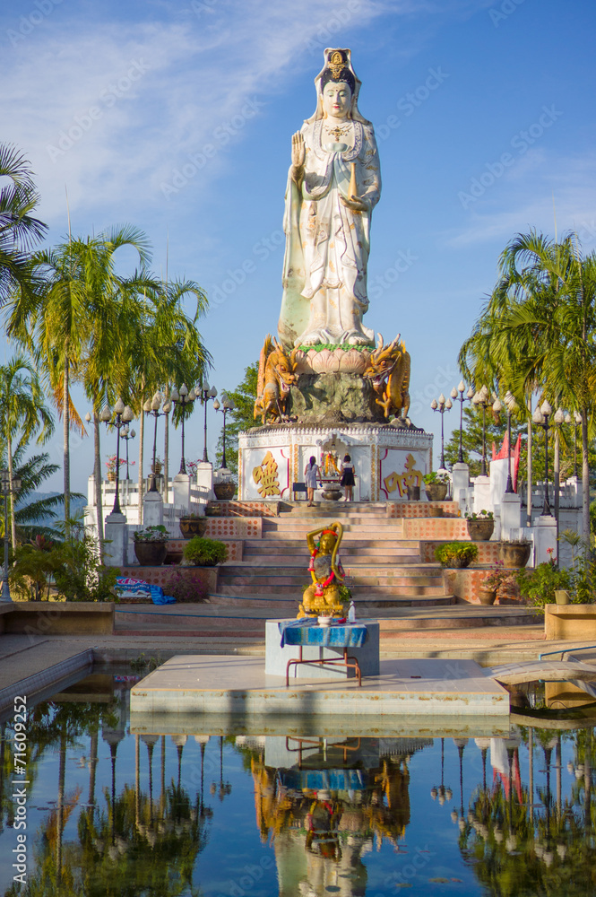 Place of worship in front of statue of Guan Yin / Kuan Im goddes