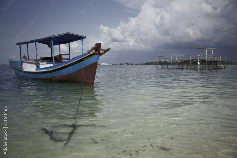Wooden fisher boat on indonesian sea