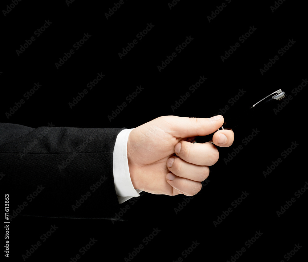 Caucasian male hand in a business suit isolated Caucasian male hand in a business suit isolated