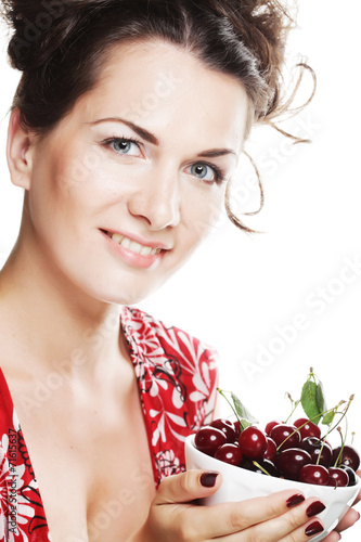 woman with cherries over white photo