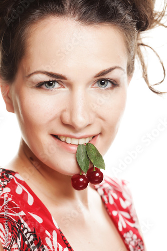 woman with cherries over white photo