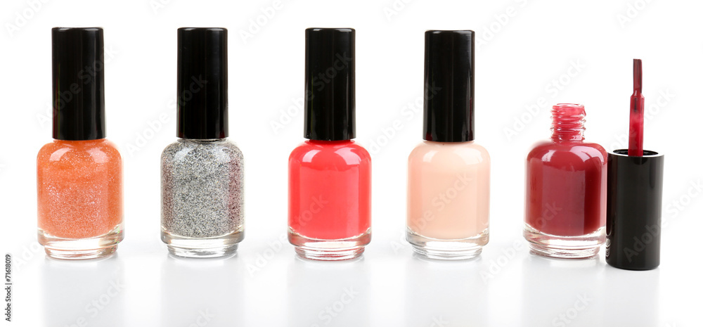 Colorful nail polishes isolated on white Colorful nail polishes isolated on white