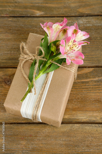Natural style handcrafted gift box with fresh flowers and © Africa Studio