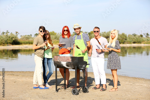Young friends having barbec...