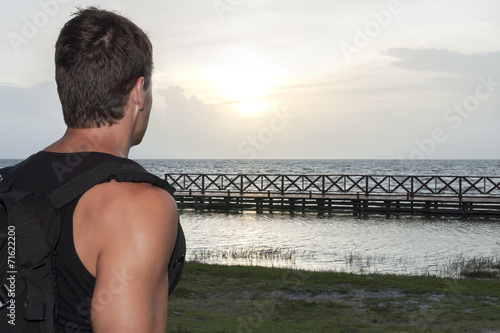 Hiker observing sunrise