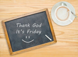 Thank god ,It's Friday  on chalkboard with coffee cup