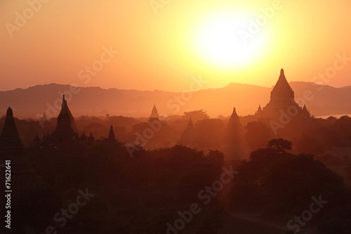 silhouettes of ancient Buddhist Temples