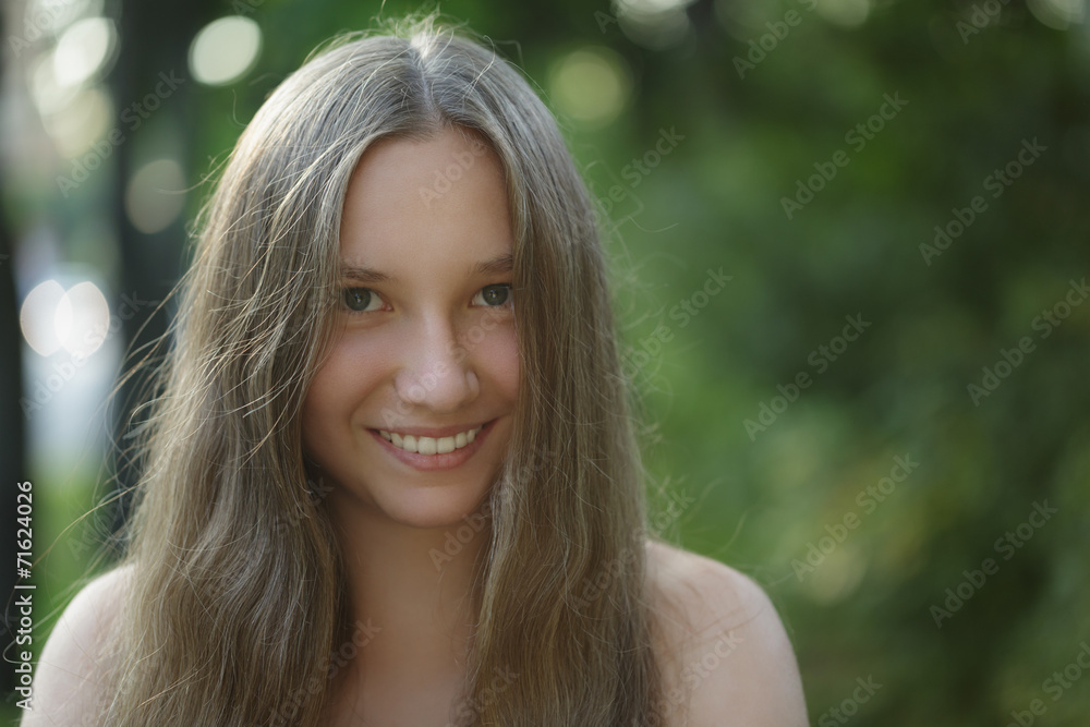teen girl smiling on outdoor walk