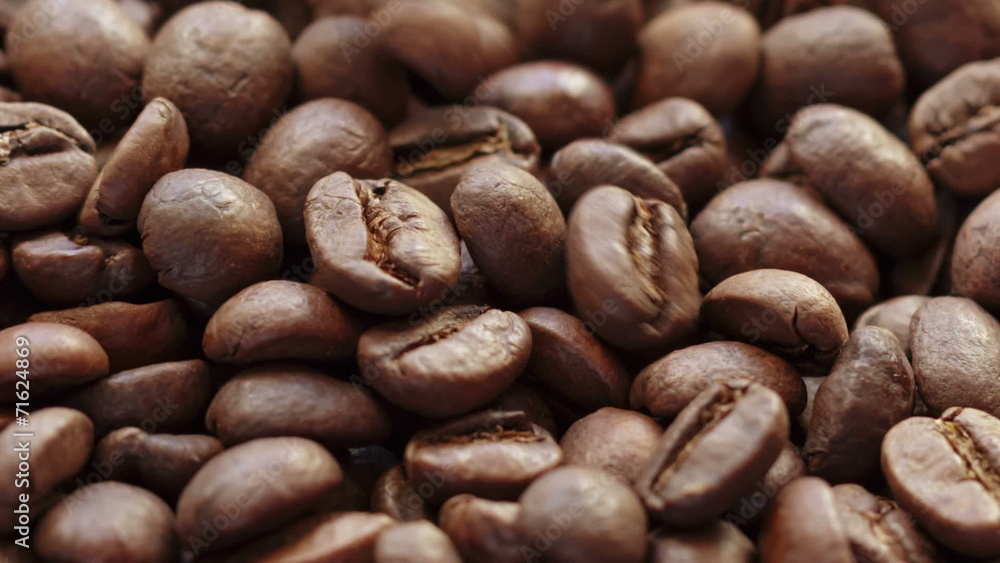 falling coffee beans closeup, made from raw falling coffee beans closeup, made from raw