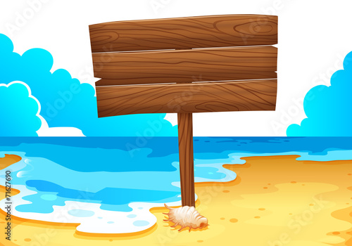 An empty wooden signboard at the sea photo