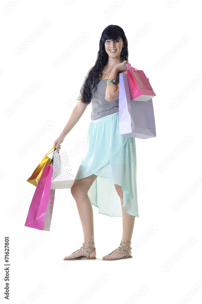 Young attractive girl with shopping bags isolated on white Young attractive girl with shopping bags isolated on white
