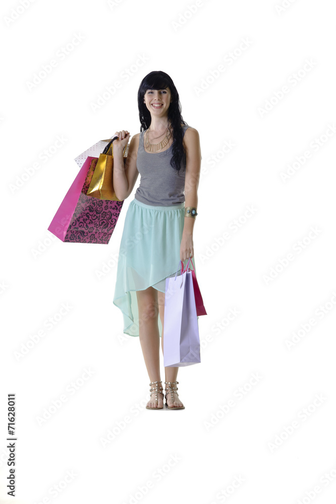 Young attractive girl with shopping bags isolated on white Young attractive girl with shopping bags isolated on white
