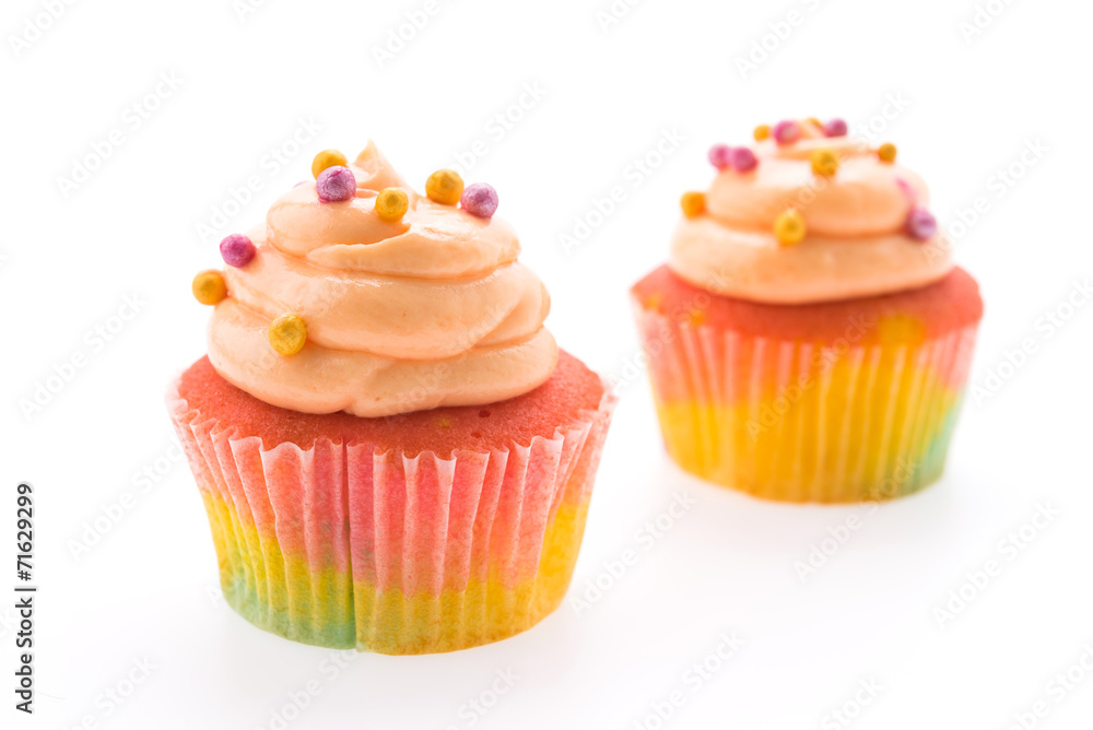 Colorful cupcakes isolated on white