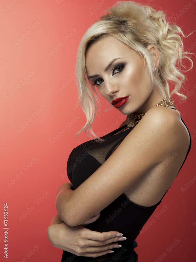 Elegant beautiful blonde woman in sexy pose. Elegant beautiful blonde woman in sexy pose.
