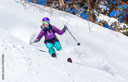 Off-piste skiing in deep snow