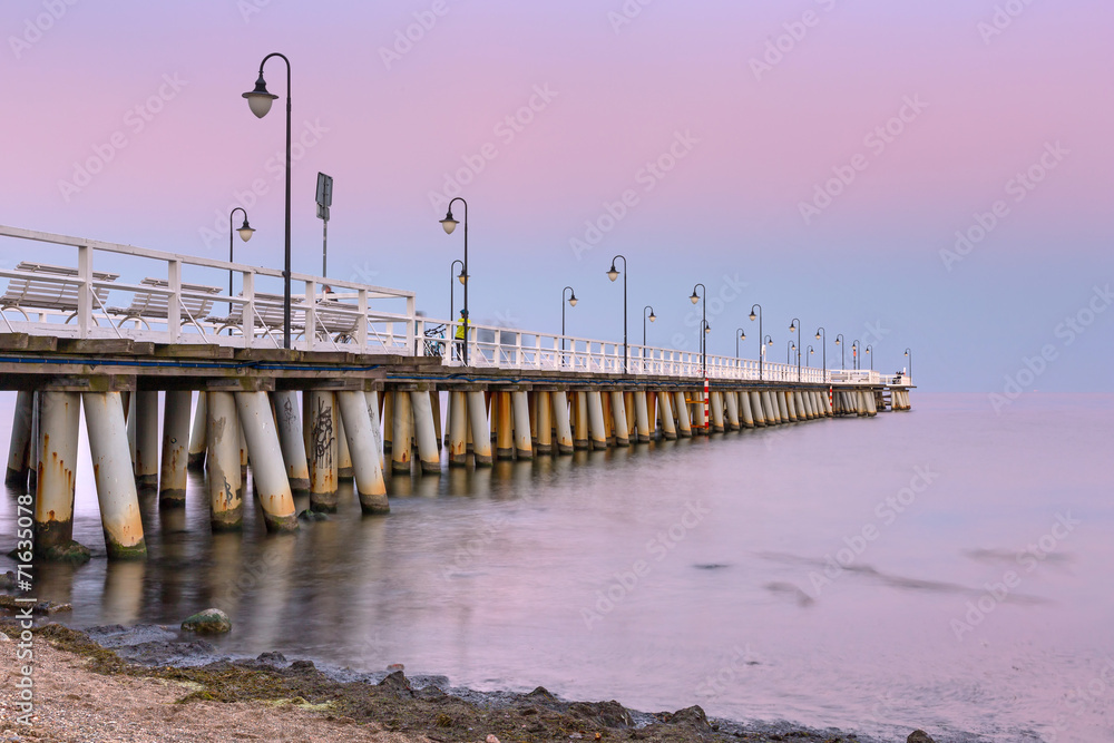 Fototapeta premium Baltic pier in Gdynia Orlowo at sunset, Poland